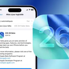 Ekran iPhone'a z opcją pobrania iOS 26 Beta. Obok duży znak "26" na niebieskim tle.