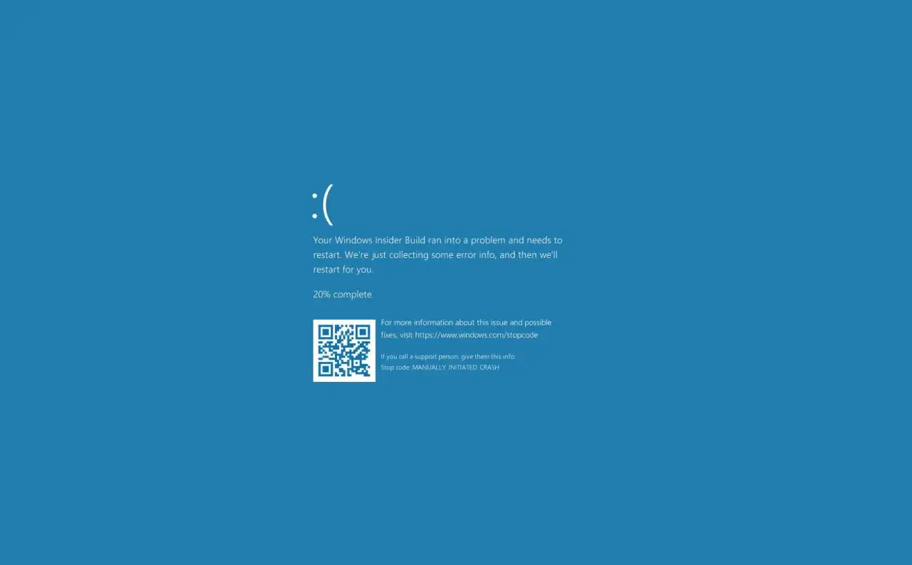 Smutna buźka na niebieskim ekranie Windows 10. System zgłosił błąd i zbiera informacje przed restartem.
