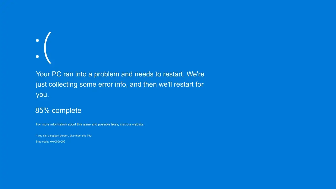 Smutna buźka na niebieskim ekranie Windows 11. Komputer napotkał problem i zbiera informacje o błędzie, 85% kompletne.